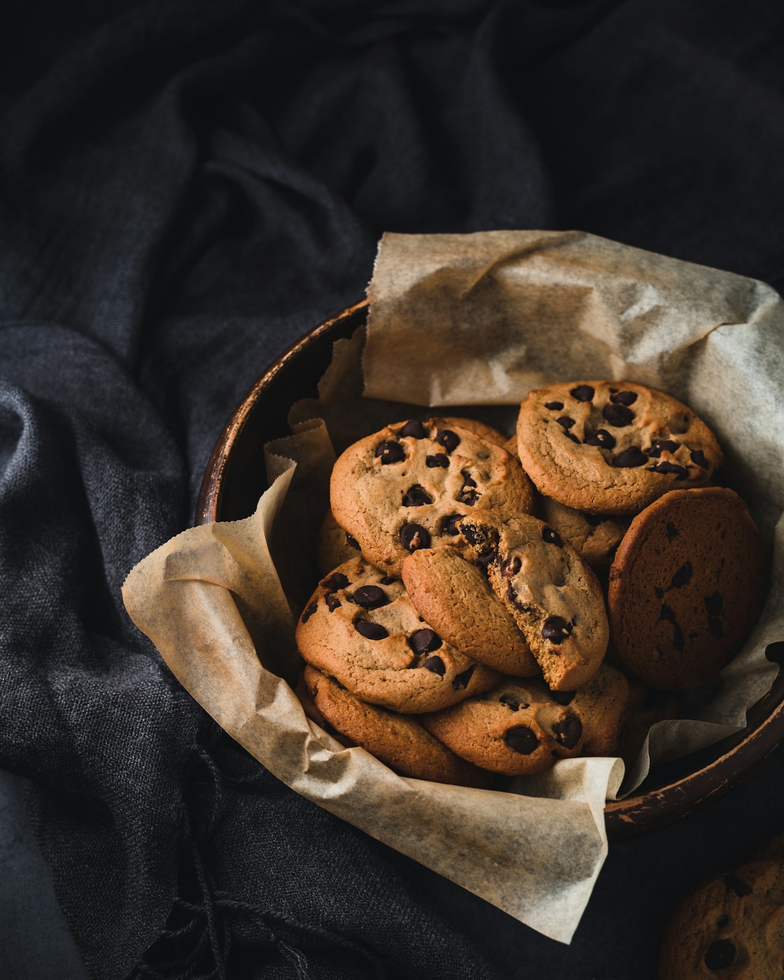A broken chocolate chip cookie